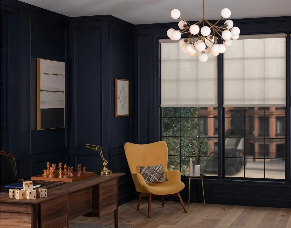 Motorized window shades in a modern living space